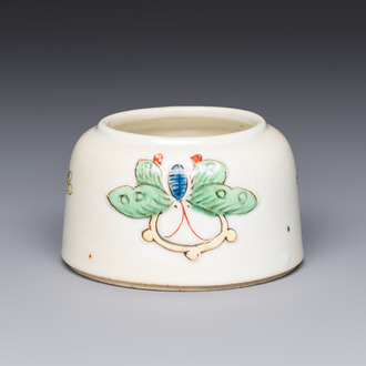 A Chinese famille verte 'Butterflies' water pot with relief design, Kangxi