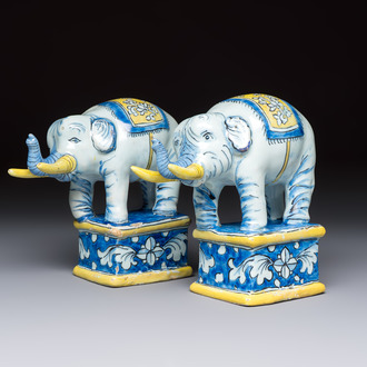 A pair of blue, white and yellow Frankfurt faience models of elephants, ca. 1700