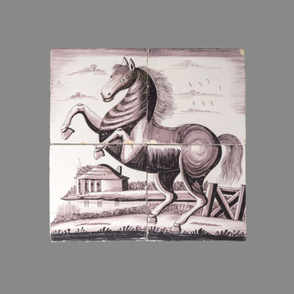 A manganese Dutch Delft four-tile panel with a rearing horse, 18th C.