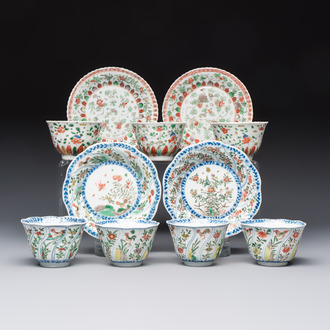 Seven Chinese famille verte cups and four saucers, conch shell and lingzhi marks, Kangxi
