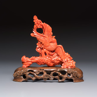 A Chinese carved red coral 'Birds and Flowers' group on a wooden stand, 19/20th C.