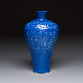 A Chinese archaistic blue-glazed vase with relief design, 20th C.