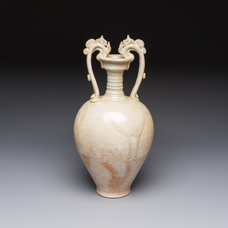 A Chinese straw-glazed pottery amphora with double dragon-shaped handles, Tang