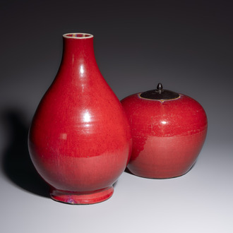 A Chinese flambé-glazed vase and a jar with wooden cover, 19th C.