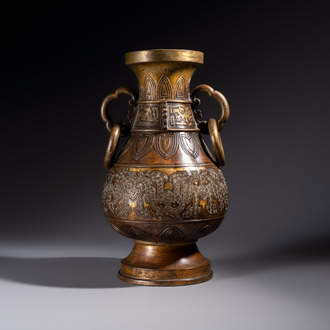A fine and large Chinese archaistic gilt-bronze vase with handles, Ming