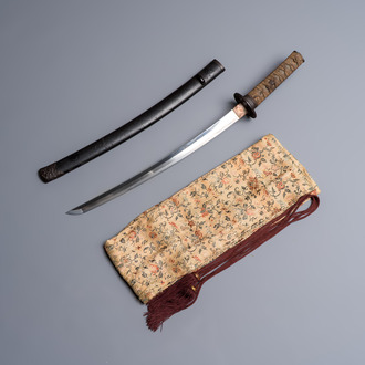 A Japanese wakizashi, signed Izumi no Kami Kanesada, with koshirae, Edo, 18/19th C.