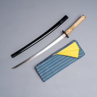 A Japanese katana, signed Yamashiro no Kami Fujiwara Kunikiyo, inscribed 'forged from Nanban tetsu' and chrysanthemum crest, with koshirae, ca. 1629-1665