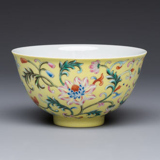 A Chinese famille rose sgraffito lemon-yellow-ground 'Flower Scrolls' bowl, Qianlong mark, 20th C.