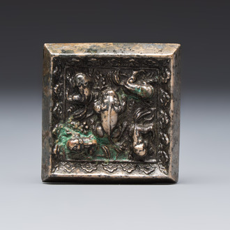 A small Chinese metal-alloy square mirror with relief design, Tang