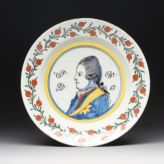 A polychrome Dutch Delft 'orangist' 'royal portrait' plate, 18th C.