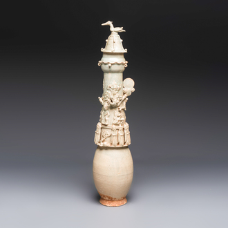 A large Chinese qingbai covered urn applied with immortals and a dragon, Northern Song