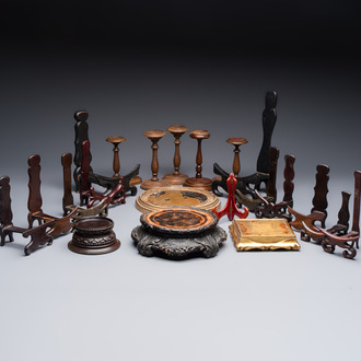 A collection of 21 wooden stands, 20th C.