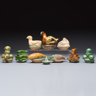 A group of ten Chinese glazed pottery mingqi, Ming