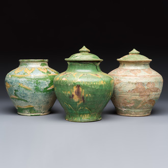 Three Chinese sancai-glazed pottery jars, two with cover, Ming or earlier