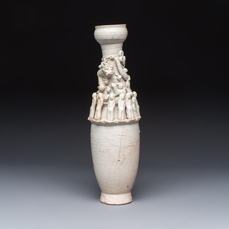 A Chinese qingbai urn applied with immortals and a dragon, Northern Song