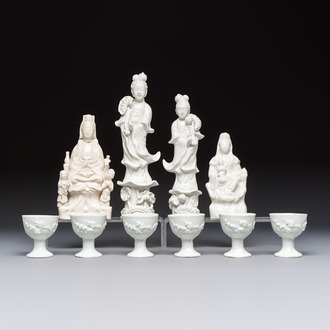 Four Chinese Dehua blanc de Chine figures of Guanyin and six wine cups, Kangxi and later