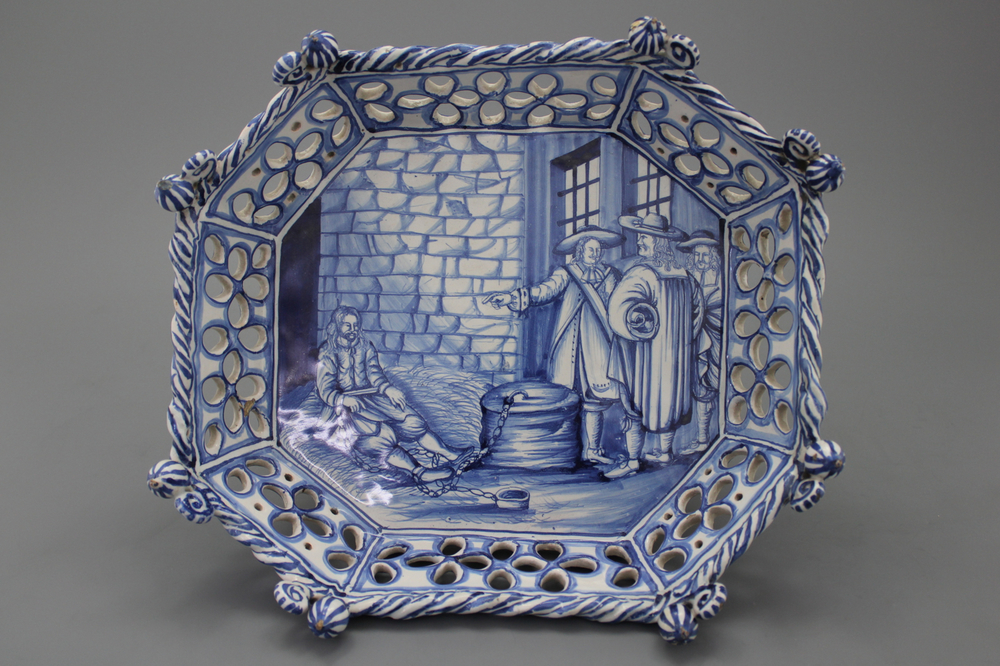 A Frankfurt Delftware ajour basket with a prison scene, dated 1679