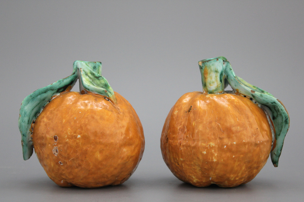 A pair of Brussels or Delft faience models of oranges, 18th C.
