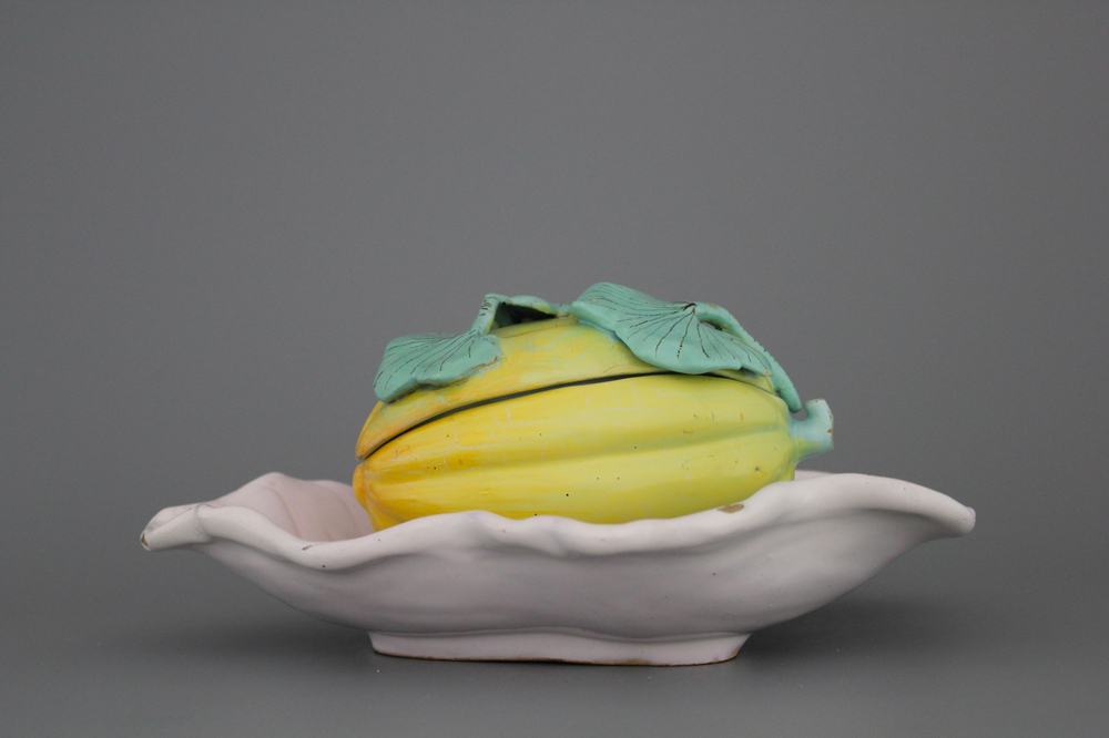A Schrezheim faience tureen modelled as a melon on a fixed leaf, 18th C.