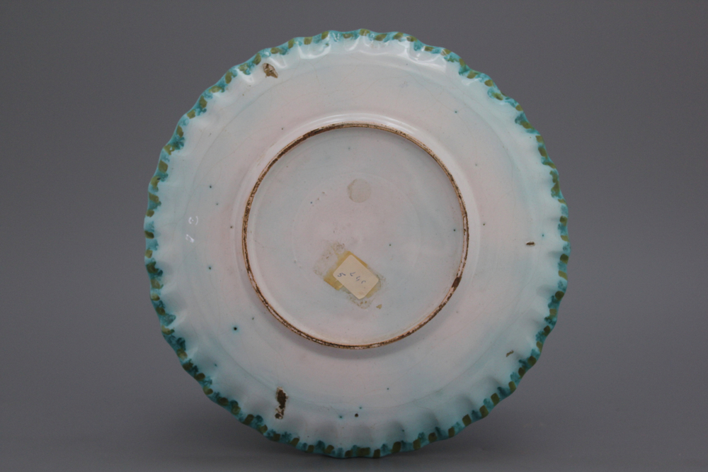 A notched Brussels faience butterfly plate, 18th C.