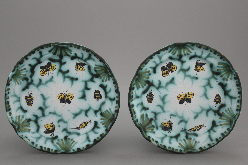 A pair of lobed Brussels faience butterfly plates, 18th C.