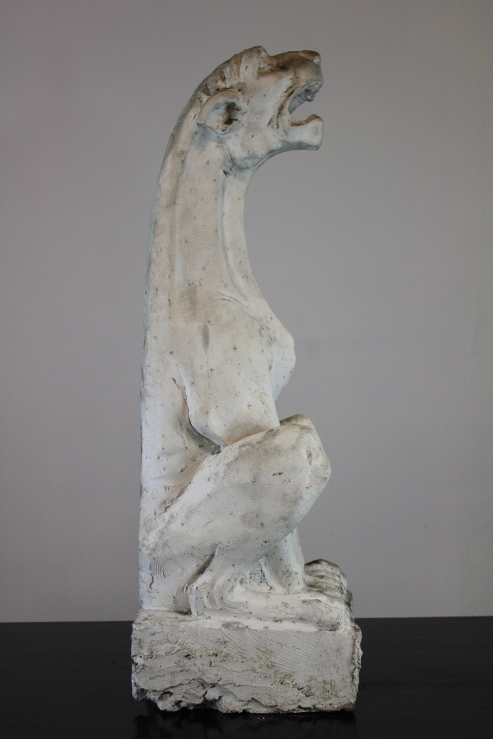 A large plaster cast of a gargoyle, workshop De Wispelaere, Bruges, 1st half 20th C.