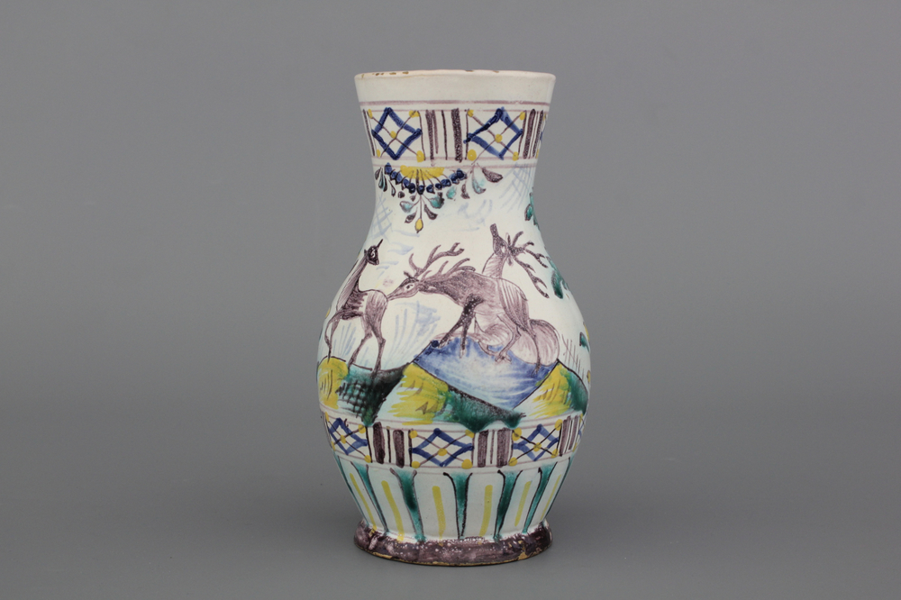 A German or Austrian faience beer jug with deers, ca. 1800