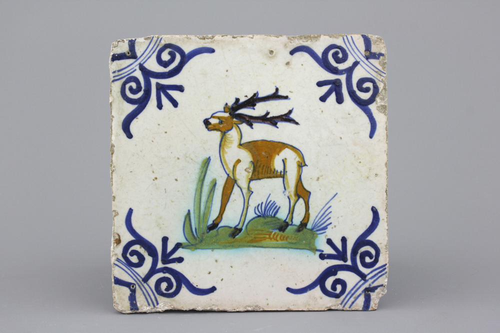 A polychrome Dutch Delft tile with a deer 17th C.
