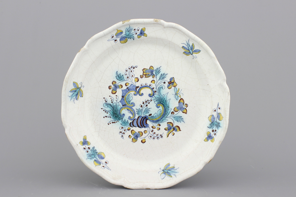 A Brussels faience rocaille plate, 18th C.
