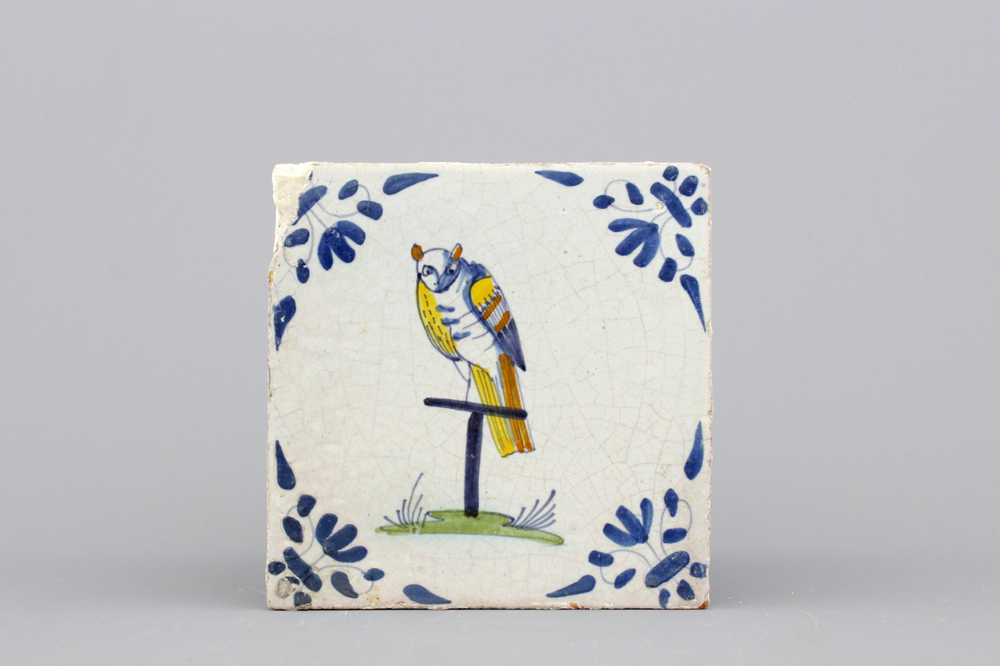 A Dutch Delft polychrome tile with an owl, 17th C.