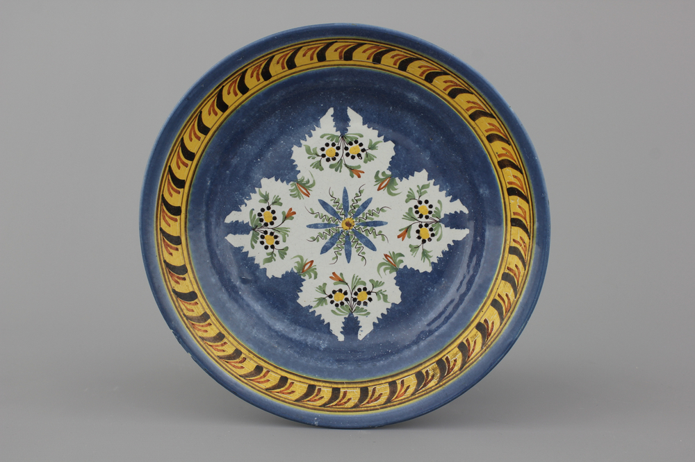 A Brussels faience blue ground plate, 18th C.
