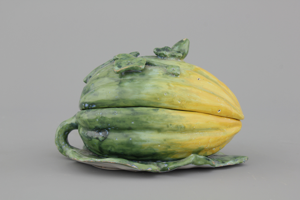 A Dutch Delft polychrome melon shaped tureen and cover, 18th C.