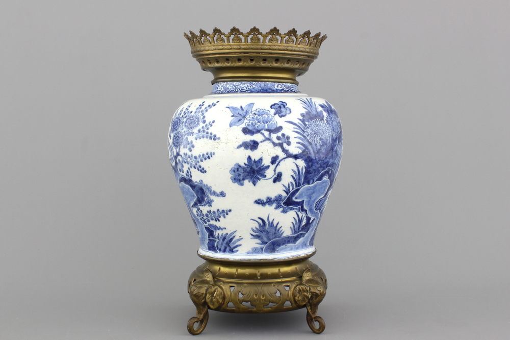 A Dutch Delft blue and white brass-mounted vase, late 17th C.