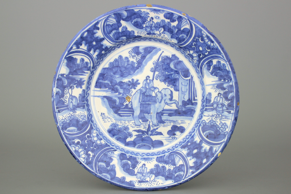 A Dutch Delft blue and white chinoiserie kraak style dish with an elephant, 17th C.