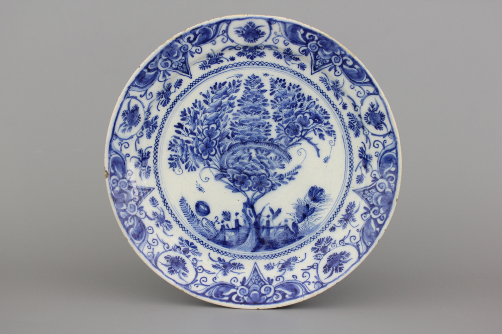 A fine Dutch Delft blue and white "Tea tree" pancake plate, ca. 1700