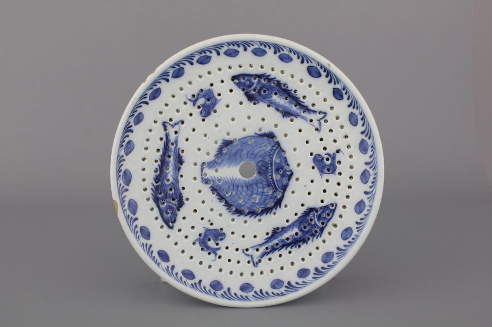 A rare Dutch Delft blue and white round fish strainer, 18th C.