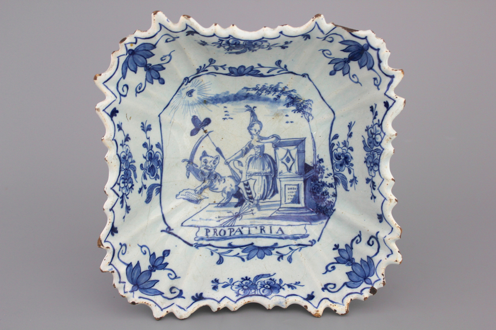 A Dutch Delft blue and white patriotic square bowl, 18th C.