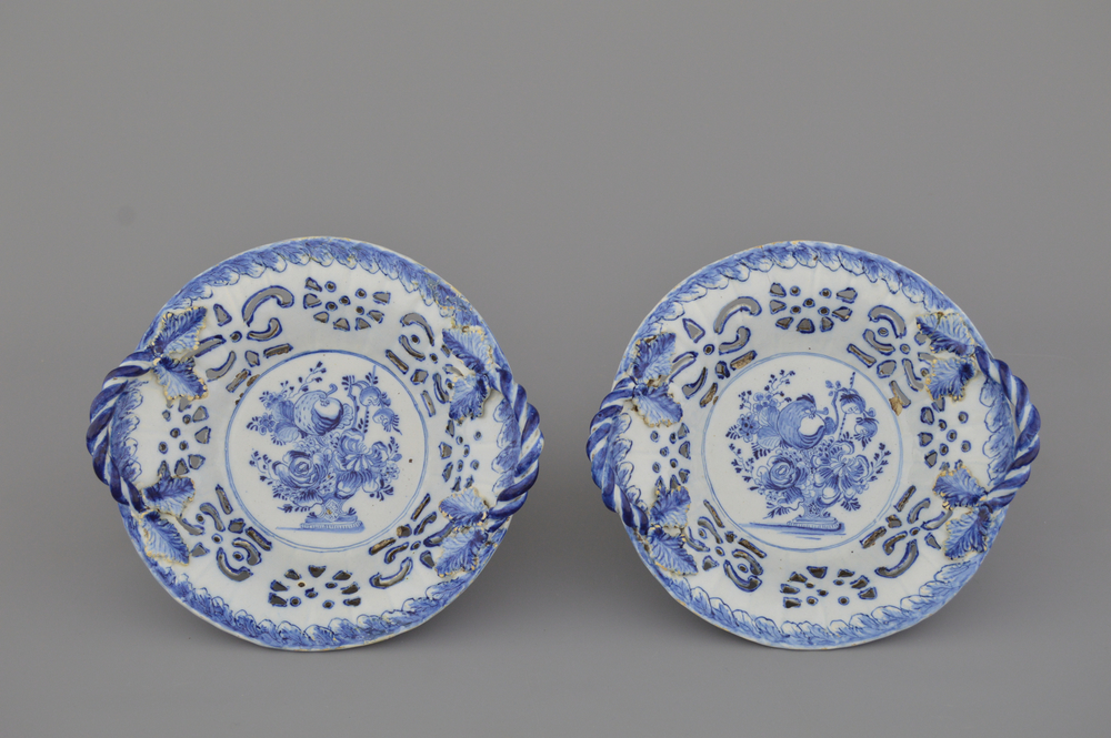 A pair of Dutch Delft blue and white open-worked baskets, 18th C.