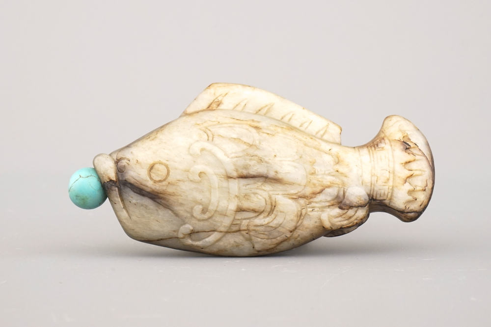 A Chinese fish-shaped carved hardstone snuff bottle
