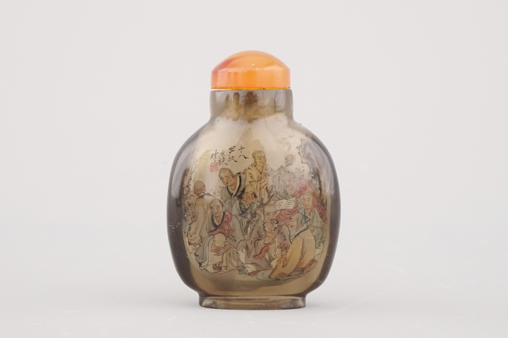 A Chinese reverse painted glass snuff bottle