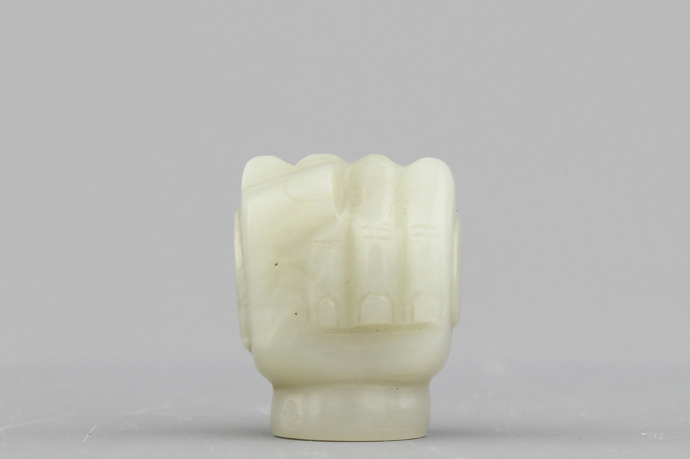 A celadon jade cane handle, 20th C.