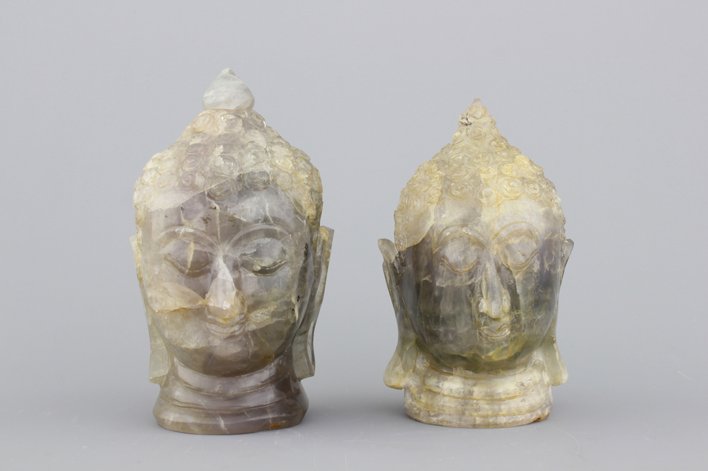 Paire de t&ecirc;tes de Bouddha sculpt&eacute;es en quartz, 20e