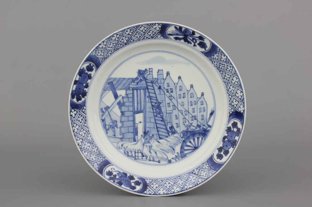 A Chinese porcelain blue and white plate with a "Rotterdam Riot" decor, Kangxi
