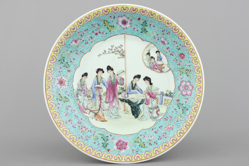 A fine large Chinese porcelain charger with ladies in a garden, 20th C.