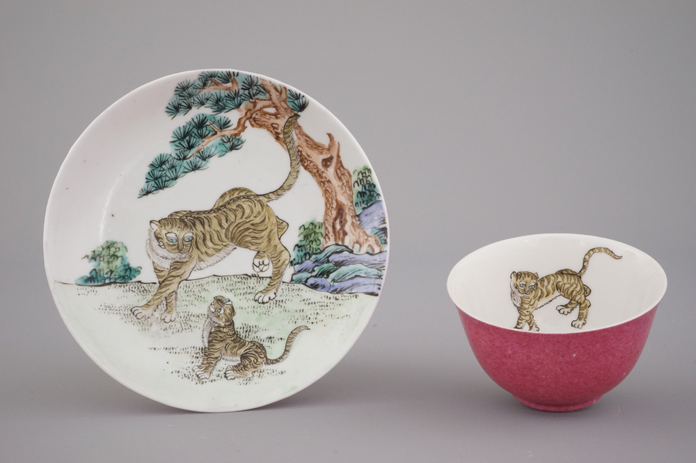 A fine Chinese semi-eggshell ruby back porcelain cup and saucer with a tiger, probably Yongzheng, 18th C.