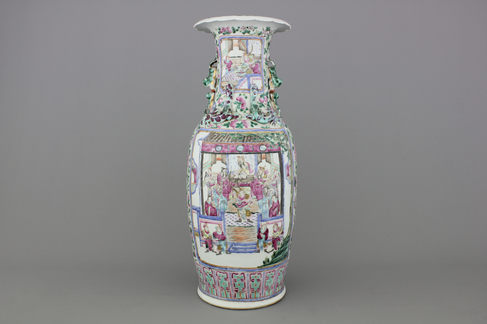 A Chinese porcelain famille rose vase with a palace scene, 19th C.