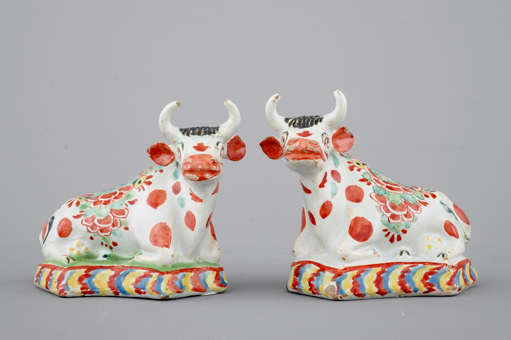 A pair of petit feu polychrome Dutch Delft cows, 18th C.