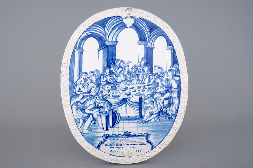 A massive dated Amsterdam Delftware plaque with "The wedding at Cana", ca. 1743