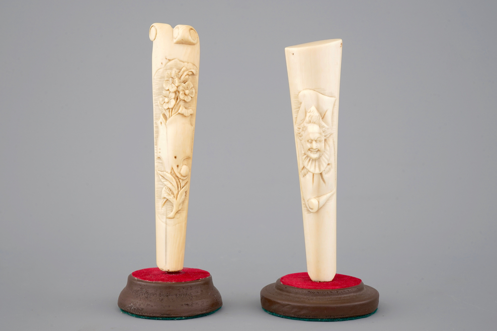 Two carved ivory umbrella or parasol handles, Dieppe (?), 19th C.