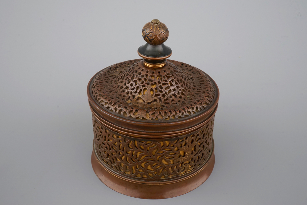 A cylindrical brass and bronze box and cover, 16/17th C., probably Venice